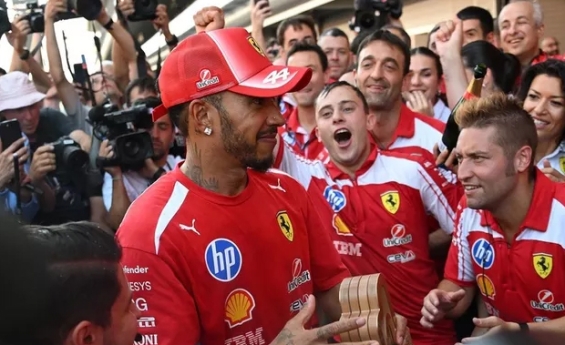 LEWIS HAMILTON SAYS KIM KARDASHIAN MAKES HIM A 'HAPPIER MAN'