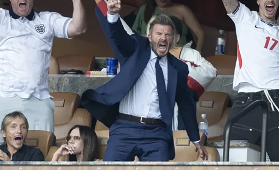 DAVID BECKHAM CELEBRATES ENGLAND'S WORLD CUP GOAL AS VICTORIA'S CALM REACTION GOES VIRAL