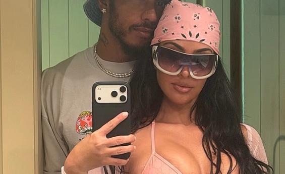 KIM KARDASHIAN AND LEWIS HAMILTON EMBRACE AS SHE WEARS A STEAMY BIKINI