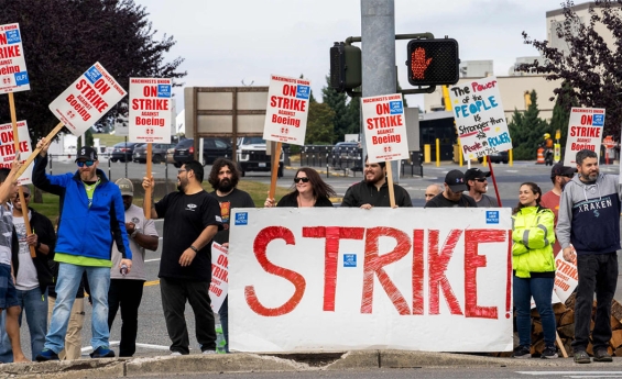 BOEING WORKERS ACCEPT 38% PAY RISE, STRIKE ENDS