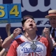 JOEY CHESTNUT EATS 66 HOT DOGS TO AGAIN CLAIM MUSTARD BELT