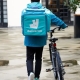DOORDASH AGREES TO BUY DELIVEROO