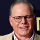 HOLLYWOOD CEOS CASH IN AS INDUSTRY STRUGGLES TO KEEP UP