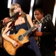 TAYLOR SWIFT CALLS PERFORMING WITH HER BAND AGAIN AFTER TWO YEARS A 'VIBE'