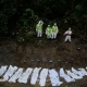 MASS BURIALS IN NEPAL AS DEATH TOLL FROM FLOODS EXCEEDS 1000