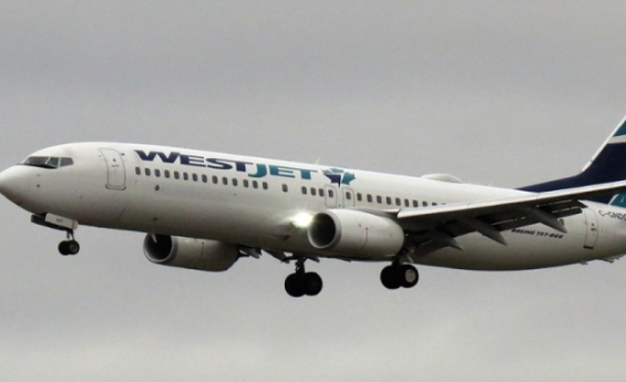 FLIGHT ATTENDANTS AT CANADA’S WESTJET GO ON STRIKE IN DISPUTE OVER PAY