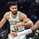 BOSTON CELTICS CLAIM CLOSE WIN