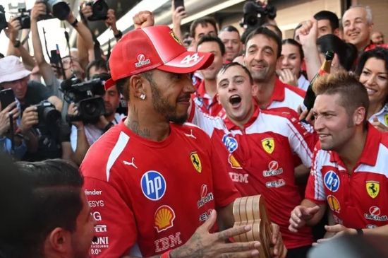 LEWIS HAMILTON SAYS KIM KARDASHIAN MAKES HIM A 'HAPPIER MAN'