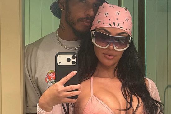 KIM KARDASHIAN AND LEWIS HAMILTON EMBRACE AS SHE WEARS A STEAMY BIKINI