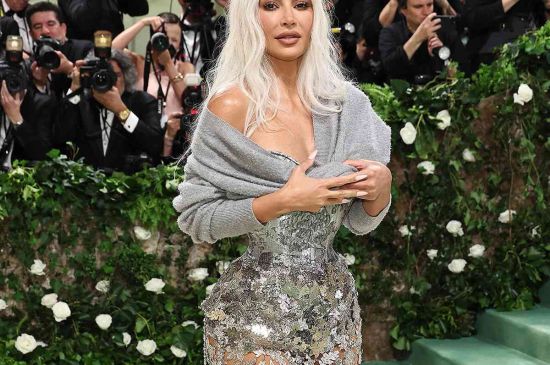 KIM KARDASHIAN STUNS IN A TIGHT CORSET AND SHEER GOWN AT 2024 MET GALA
